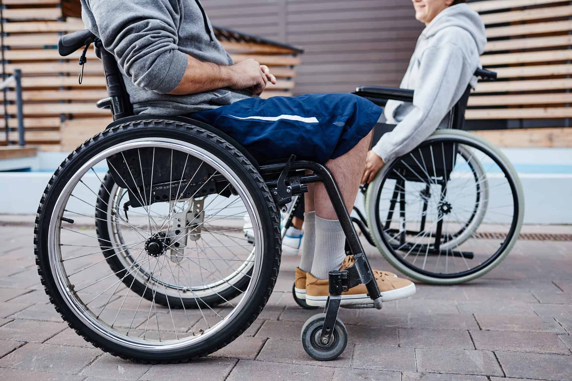 People with disability in wheelchairs