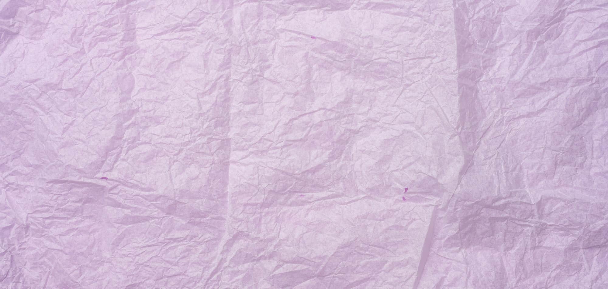 Crumpled pink tissue paper, full frame