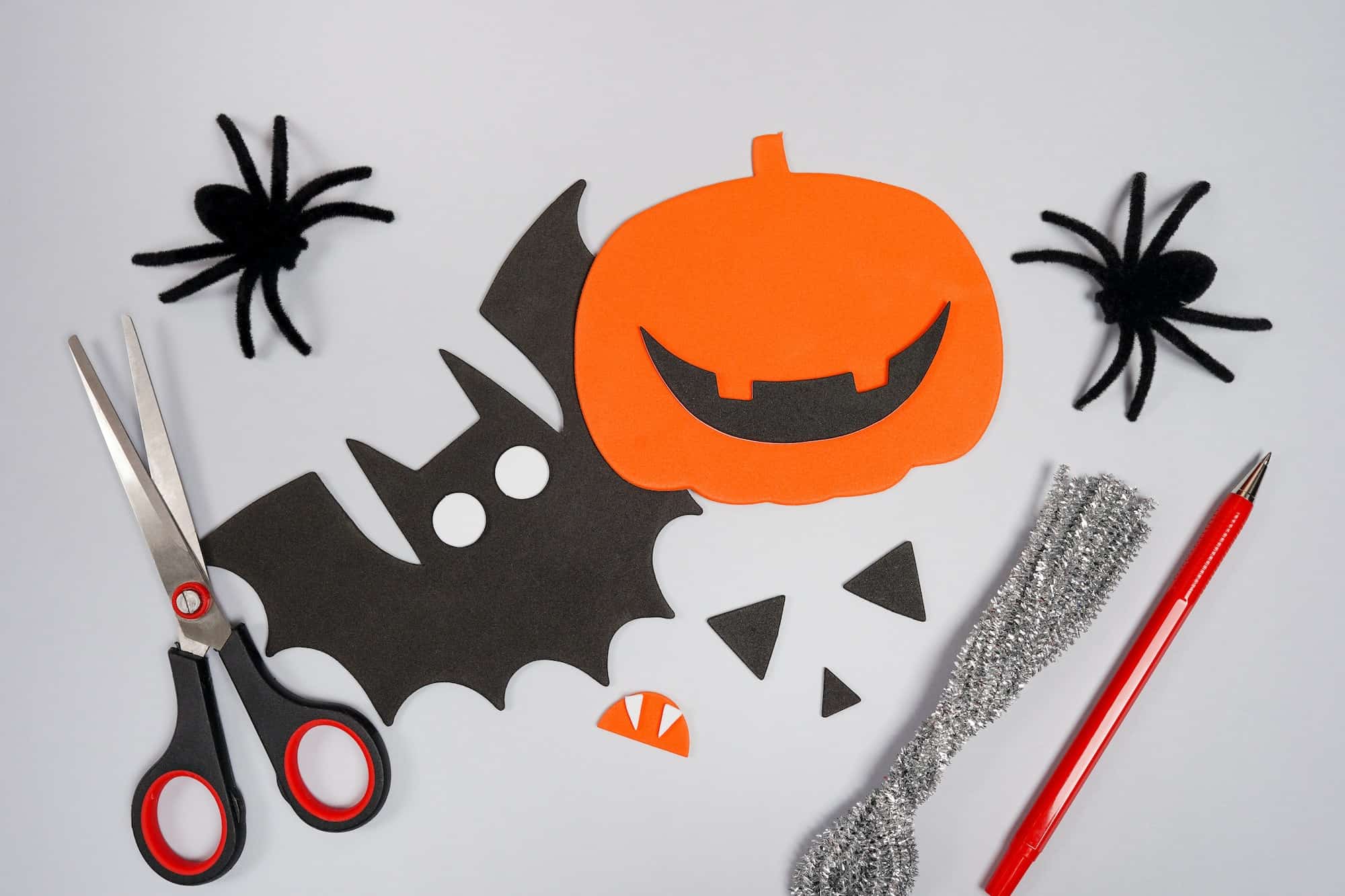 Halloween craft for kids. Materials for creativity of orange, and black colors