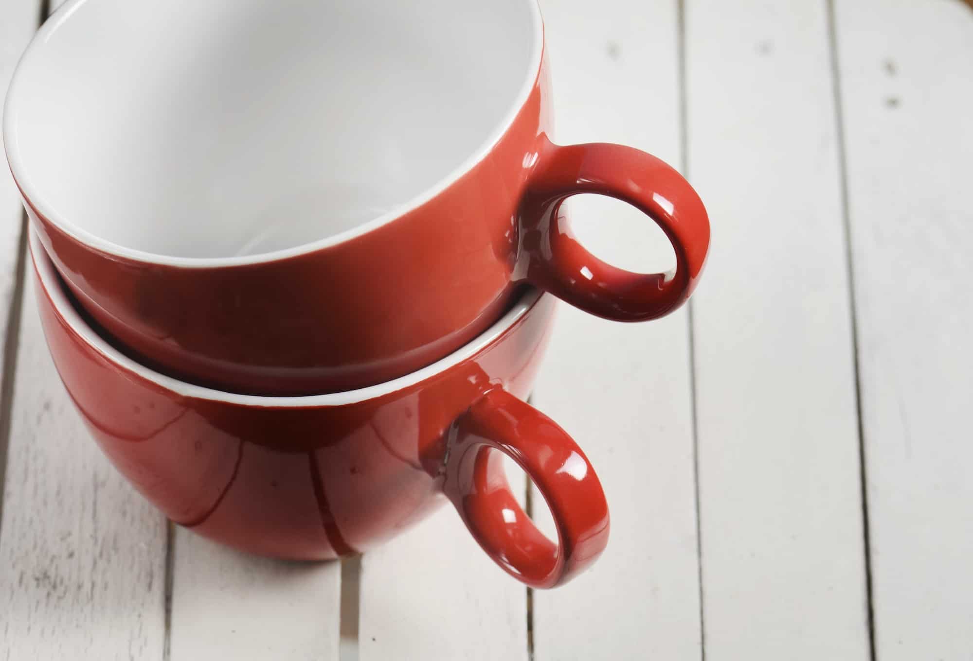 Two red coffee cups